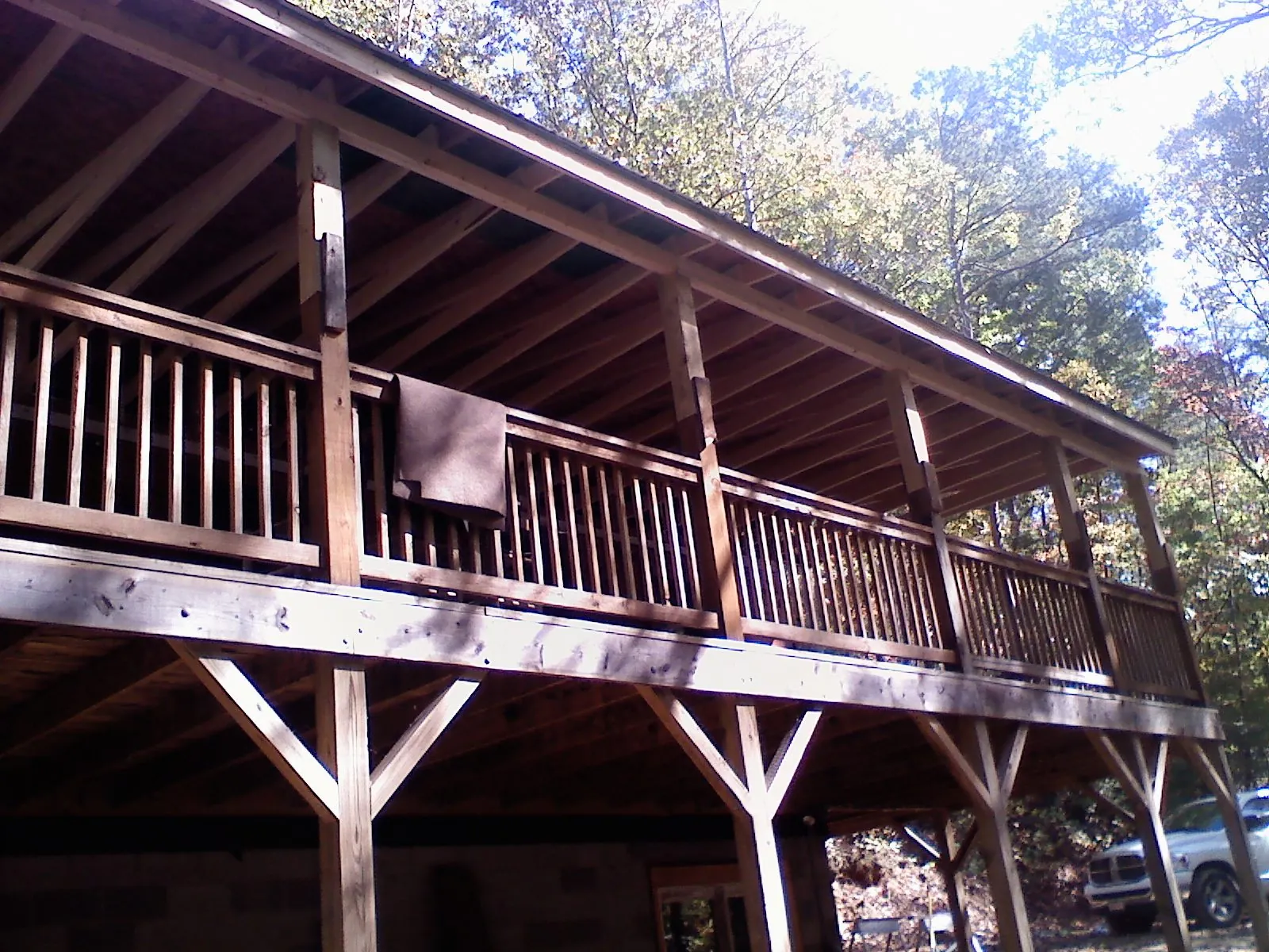 Timber framing under a new elevated porch and deck in Lake Helen